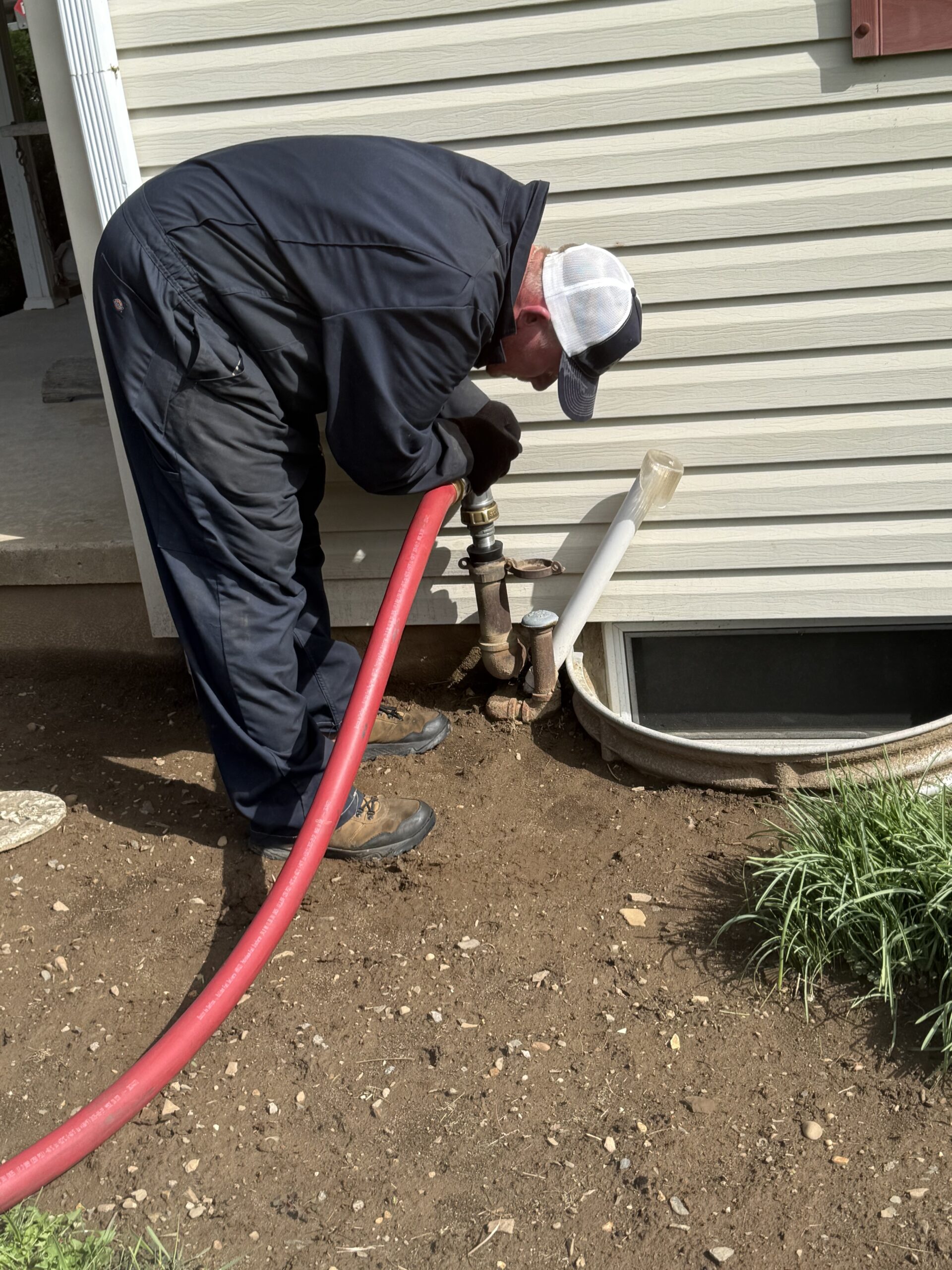 AEP Oil driver delivering heating oil to a home